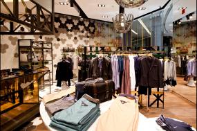 现代简约风格装饰服装店装修货架效果图