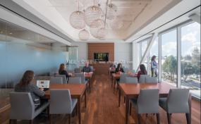 高端办公室瓷砖木地板装修效果图